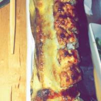 Dynamite Roll · Baked: salmon, crab salad, avocado, masago and rich sauce.
