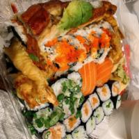 Dragon Roll · Unagi, crab salad, avocado and sauce.