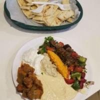 Meze Plate · Hummus, tabouli, haydari, piyaz, ezme, babaganoush, eggplant salad, fried eggplant, potato s...