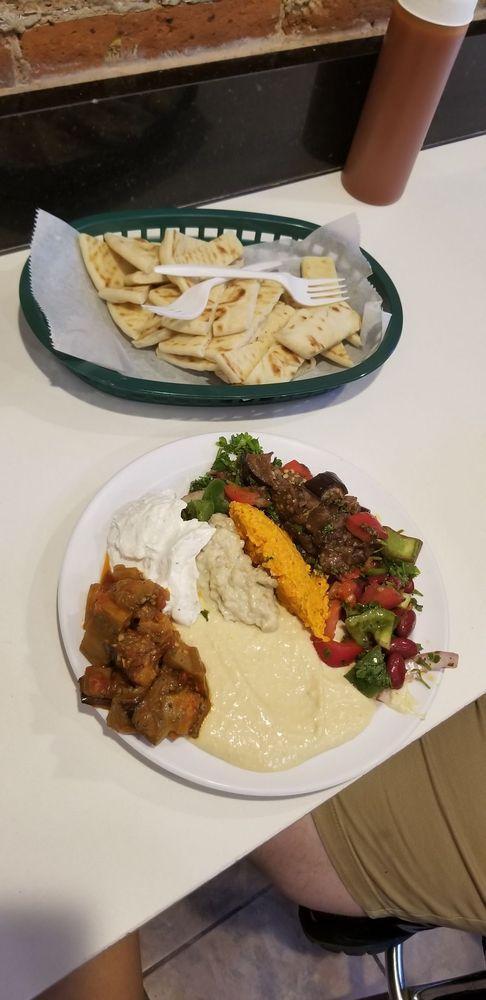 Meze Plate · Hummus, tabouli, haydari, piyaz, ezme, babaganoush, eggplant salad, fried eggplant, potato salad, and carrot salad.