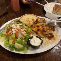 Chicken Shish Kebab · Cubed marinated chicken meat. Served with rice, Greek salad, pita, and tzatziki sauce.