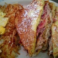 Monte Cristo · Ham, turkey, cheese on French toast and your choice of side.