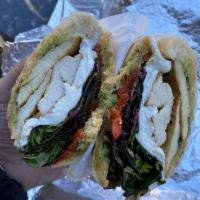 Tuscan Delight Panini · Grilled chicken, fresh mozzarella, roasted peppers, spring mixed veggies with balsamic vinai...