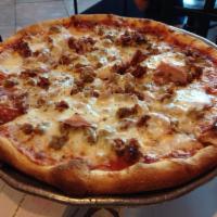 Meat Lover's Supreme Pizza · Pepperoni, sausage, ham, bacon and hamburger.