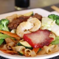 Beef Chow Fun · Stir fried vegetables and noodles.