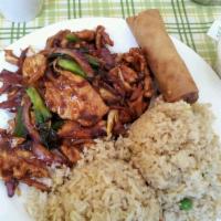 Mongolian Chicken · Tender sliced chicken wok tossed in our special hot sauce with onions and green onion placed...