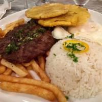 Churrasco a Lo Pobre · Grill churrasco served with rice, fries and sweet plantains and eggs and anticuchera sauce.