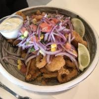 Jalea Mixta · Battered seafood mix, served with fried yucca and peruvian salsa criolla.