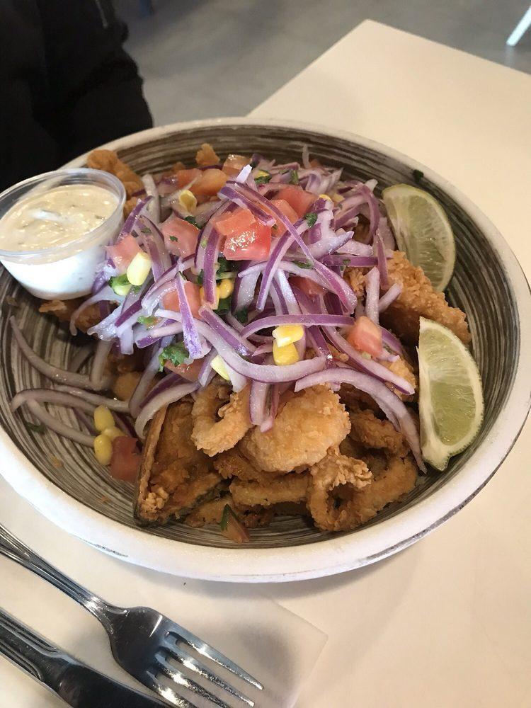Jalea Mixta · Battered seafood mix, served with fried yucca and peruvian salsa criolla.