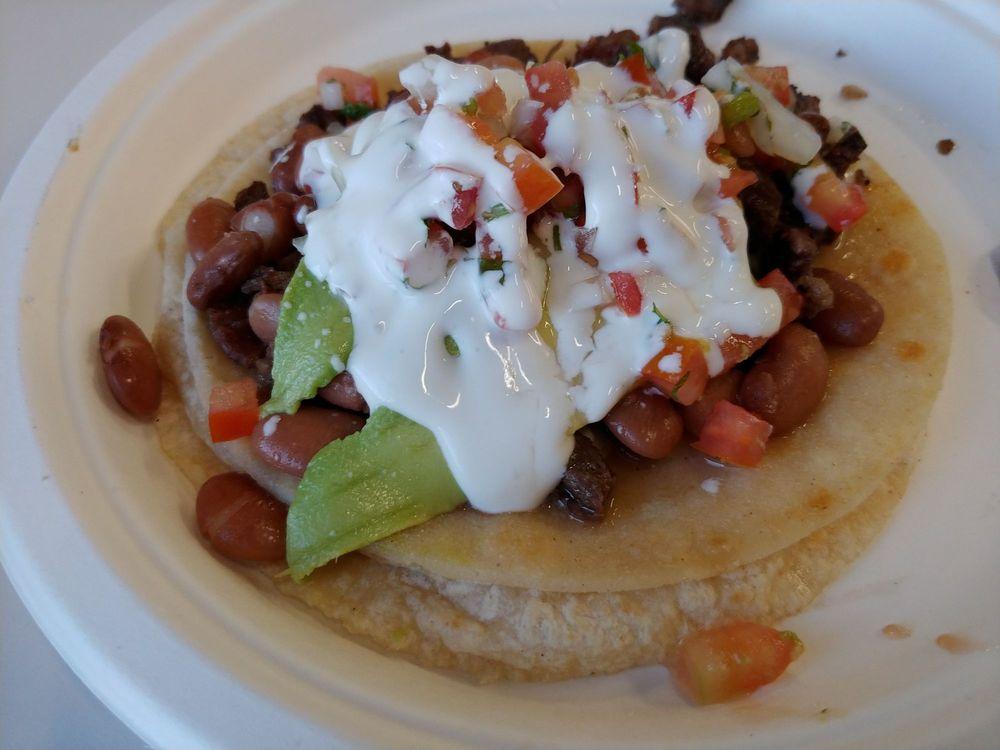 Super Taco · Two tortillas, meat, cheese, beans, pico de gallo, sour cream, and avocado.