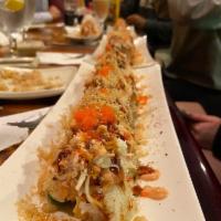 Brees Roll · Tempura salmon, jalapeno (inside), seared salmon, snow crab, crunchy, smelt roe (on top) and...