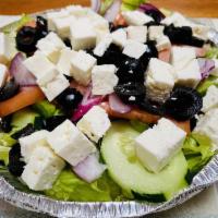 Greek Salad · Feta cheese, lettuce, tomatoes, cucumbers, black olives, red onions, green peppers & Greek v...