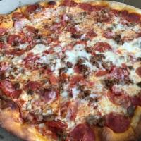 Meat Lover Pizza · Beef, sausage, ham, salami, pepperoni and cheese.