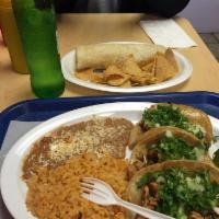 Carne Asada Burrito · Carne asada, pico de gallo, and guacamole.