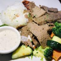 Doner Kebab · Gyro. Slices of rotisserie-cooked beef, served with rice and sauteed vegetables. Gluten free.