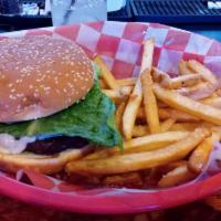 Veggie Burger · Spicy black bean vegetarian burger topped with pepper jack cheese, chipotle aioli, tomato, r...
