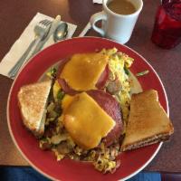 Belly Buster Omelette · Country style with ham, sausage, bacon, mushrooms, onions, peppers, cheese and home fries al...