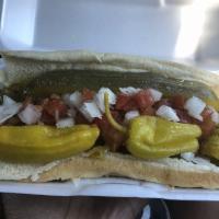 Chicago Dog · All beef sausage, black poppyseed bun, tomato, onion, sweet relish, pickle spear, sport pepp...