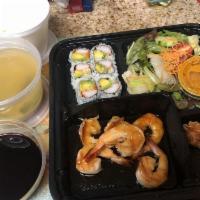 Bento Box · Served soup, salad, rice, fruits, California roll and shrimp tempura.