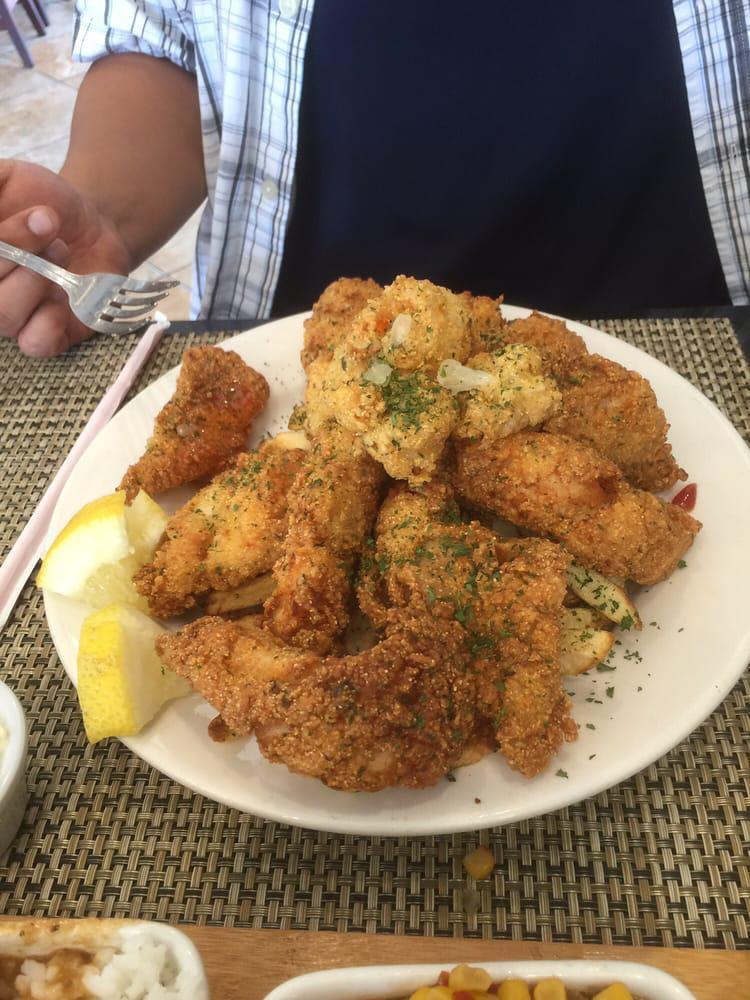Seafood Platter · Catfish, red snapper, or fish of the day, shrimp, and served with a choice of side.