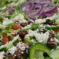 Greek Salad · A crisp blend of iceberg and romaine lettuce, fresh tomatoes, red onions, cucumbers, Kalamat...