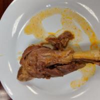 Lamb Shank Plate · Served with choice of rice, salad, and dip & pita bread.