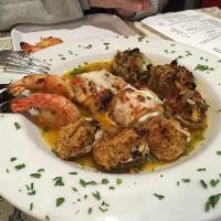 Hot Antipasto · Baked clams, shrimp oreganata, eggplant rollatini, stuffed mushroom, and fried zucchini.