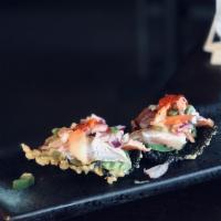 2 Fish Tacos · Seared albacore, salmon, avocado, homemade salsa on fried nori.