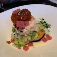 Ahi Tower · Crab meat, avocado, spicy tuna, cucumber, tobiko with eel sauce & spicy mayo, white mayo, an...