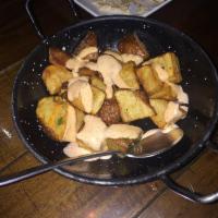 Patatas Bravas Small Tapa · Red potatoes with house spicy aioli.