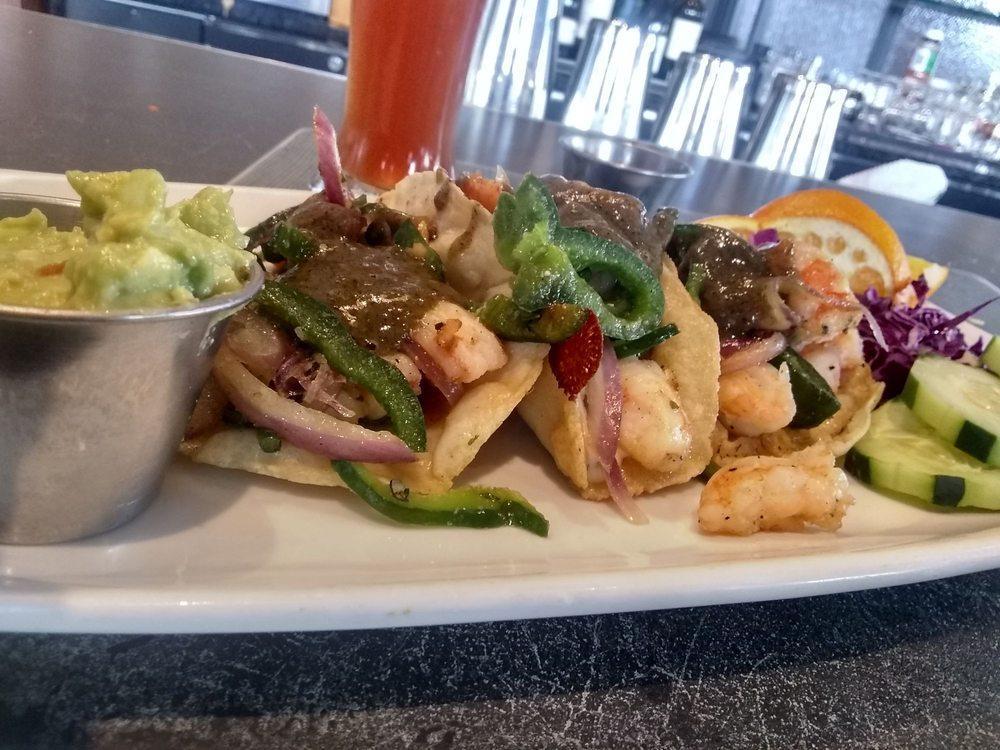 Tacos Gobernador · Shrimp tacos sauteed with papilla Chile and Oaxaca cheese, served with homemade chunky guacamole and Mazatlan Sinaloa style with Los Arroyos flavor.