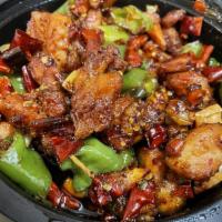 Stir Fried Chicken with Spice Roasted Chili. · 
