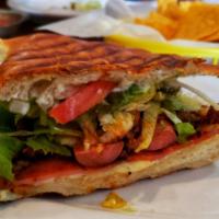 Torta Cubana Y Milanesa Torta · Served with sour cream, mayonnaise, lettuce, tomatoes, onion, jalapenos, pepper and avocado.