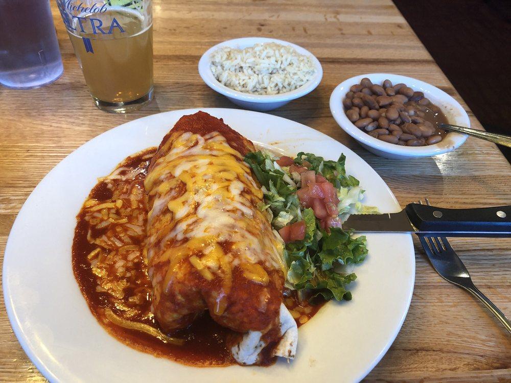 Brisket Burrito Plate · Large flour tortilla filled with beans and your choice of  brisket or steak, cheese, smothered with your choice of Frank Sr.'s red or green chile.