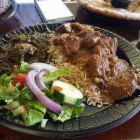 Achar Gosht Special · Spicy boneless lamb curry. Served with naan, rice, salad, green chutney and choice of vegeta...