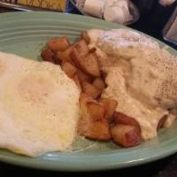 Southern Breakfast · Fresh buttermilk biscuit and sausage patty with country gravy. Served with 3 large eggs any ...