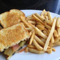 Grilled Eggplant Sandwich · Grilled eggplant, Ortega chilies, grilled red onions, tomatoes and melted Swiss on grilled s...