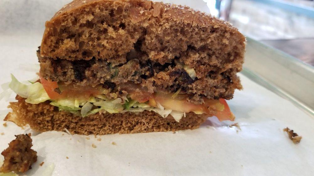 Chipotle Black Bean Veggie Burger · Vegetarian patty, lettuce, tomato, onion and pickles on wheat bun with mayo and mustard.