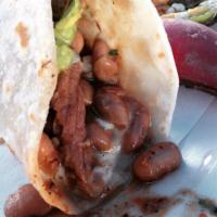 Tijuana Tacos · Two flour tortillas stuffed with Point Reyes skirt steak, melted cheese, garlicky whole bean...