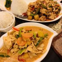 Mango Curry · Chicken breast slices with mango chunks, onions, summer squash, zucchini, carrots and bell p...