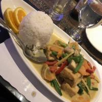 Green Curry · Choice of protein with peas, bamboo shoots, carrots, mushrooms, bell peppers, and basil leav...
