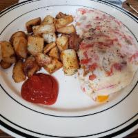 Egg White & Veggie Omelet · Three eggs, spinach, tomatoes, mushrooms, caramelized   onions and crumbled feta cheese. Ser...
