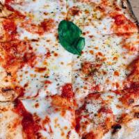 Margherita Pizza · Tomato sauce, olive oil, mozzarella, and basil.