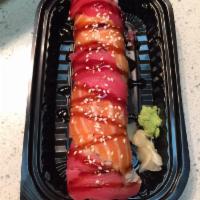 Samurai Roll · Crabmeat, unagi topped with salmon, tuna, and unagi sauce.