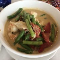 Green Curry · A choice of meat, coconut milk, green curry paste, green bean, Thai eggplant, bell pepper an...