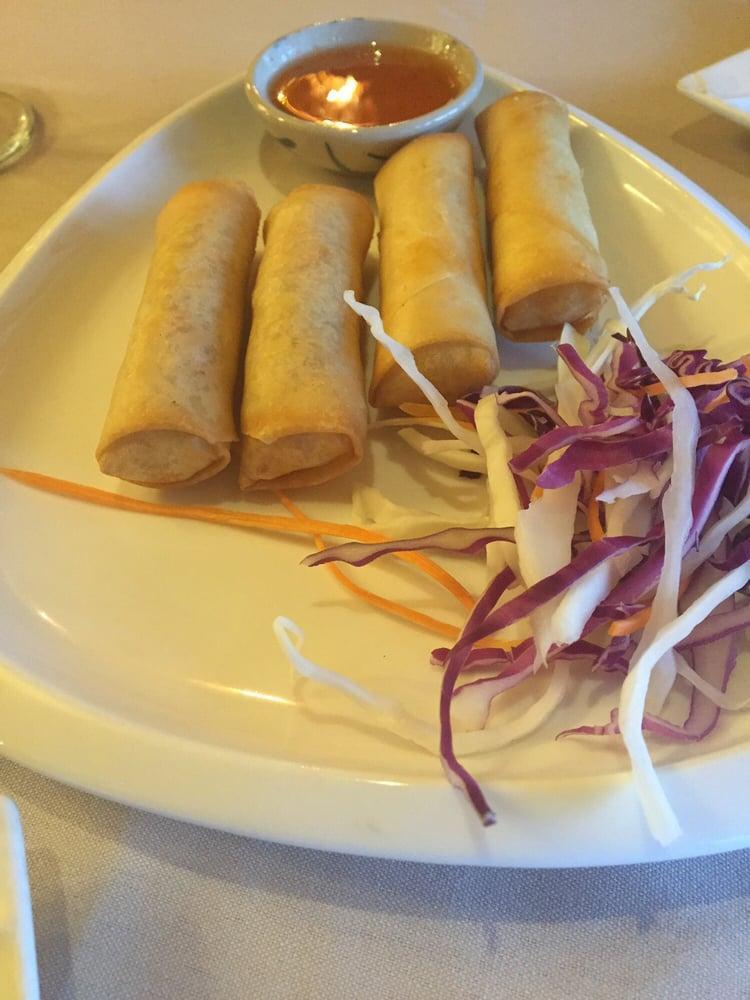 Thai Spring Rolls · Crispy light spring rolls stuffed with mixed vegetables and glass noodles served with plum sauce.
