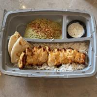 Chicken Kabob Plate · Succulent pieces of boneless chicken tenders. Basmati rice, pita bread, tzatziki, and choice...