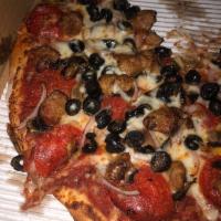Deluxe Pizza · Homemade pizza sauce, mozzarella, pepperoni, mushroom, green bell peppers, red onions, Itali...