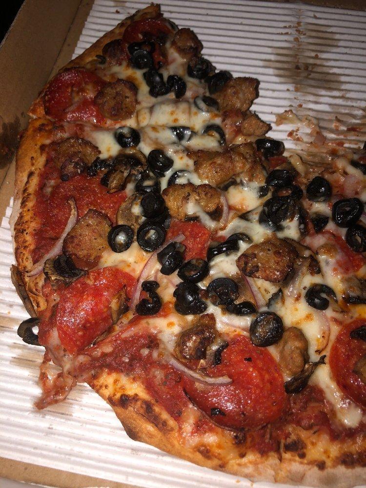 Deluxe Pizza · Homemade pizza sauce, mozzarella, pepperoni, mushroom, green bell peppers, red onions, Italian sausage and olives.