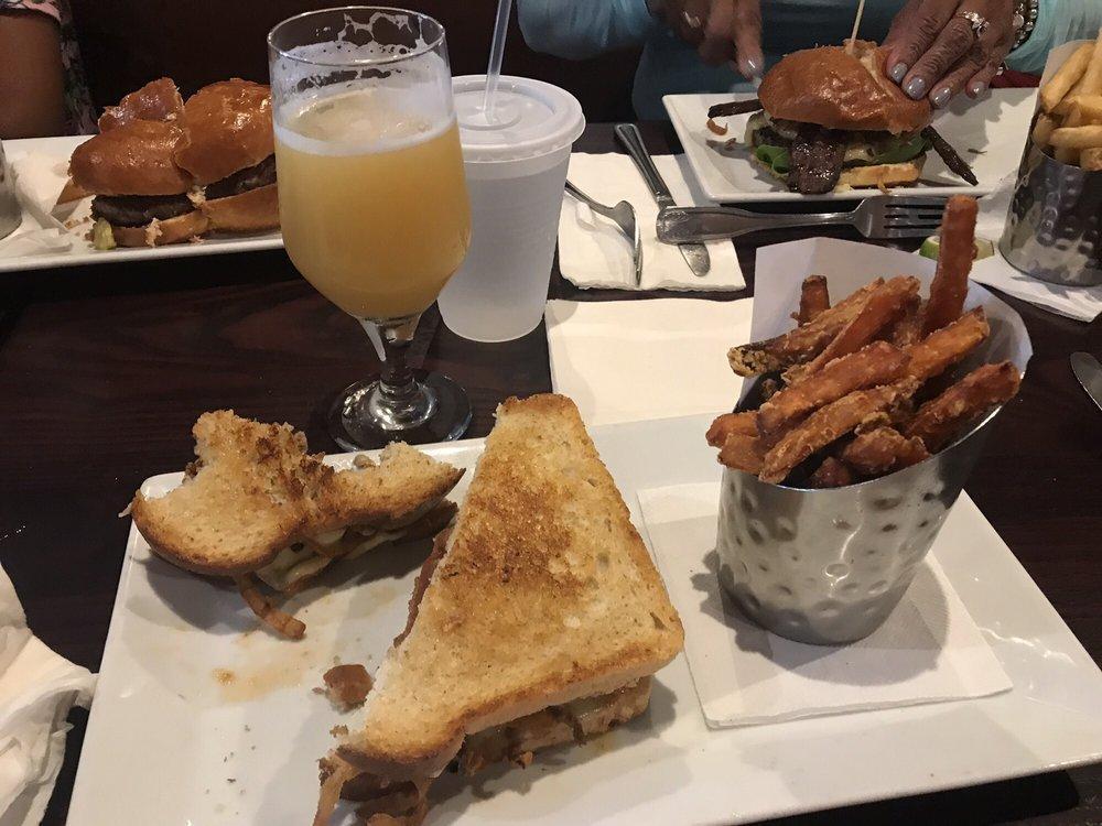 Cajun Melt Burger · Blackened ground beef patty topped with pepper jack cheese, smoked applewood bacon, tobacco fried onions, and chipotle mayo served on country sourdough.